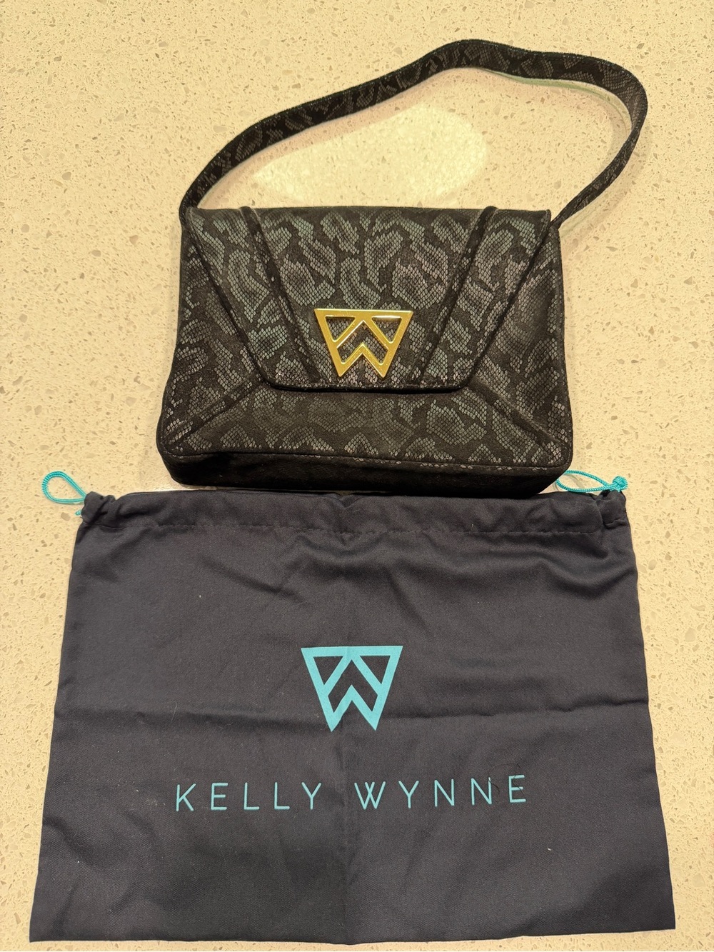 Kelly Wynne Black Snake-Embossed Shoulder Bag with Gold Logo Accent